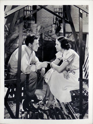 Binder with twenty-one black and white publicity photos from the 1930s